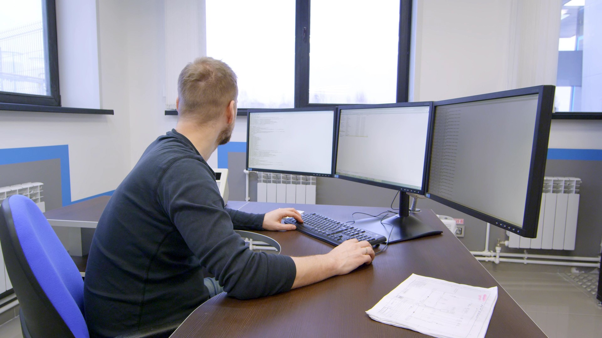 Operator of dashboard control production in control room